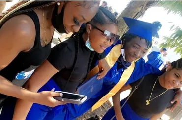 Mentees celebrating their high school graduation
